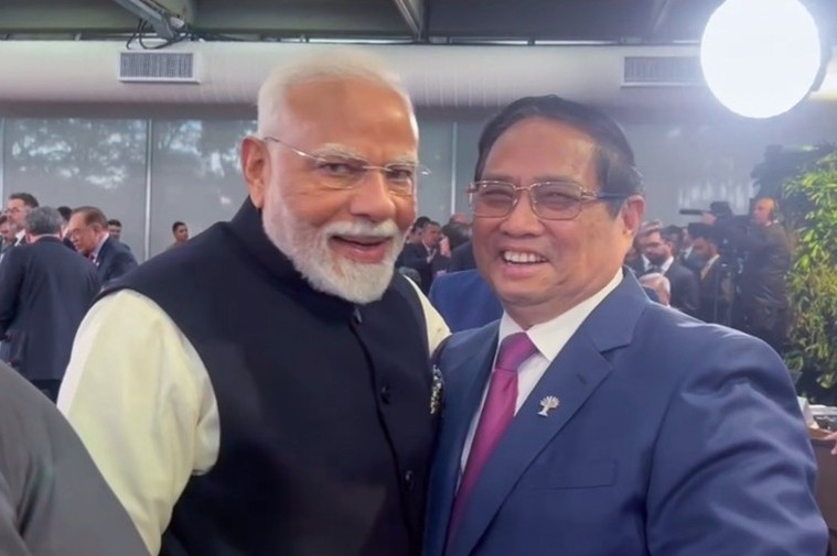 PM Pham Minh Chinh (R) and his Indian counterpart Narendra Modi in Rio de Janeiro (Photo: Government Portal)