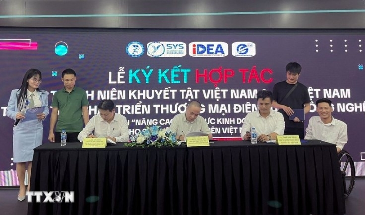 The agreement signing ceremony in Hanoi on July 10
