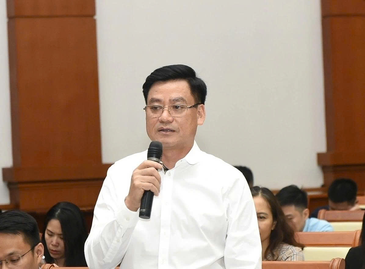 Hoang Van Thu, vice chairman of the State Securities Commission, talks Vietnam's efforts to improve the operational efficiency and capacity of its stock market, at a regular press conference of the Ministry of Finance in Hanoi on July 2