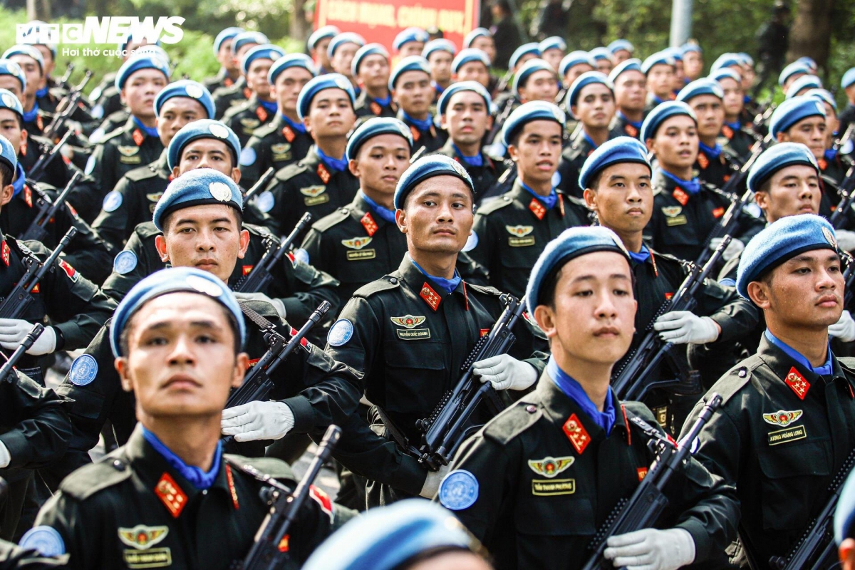 The male officers of the United Nations Peacekeeping Police Unit on the training ground present a disciplined and professional appearance, wearing their distinctive uniforms with precision. They carry out their drills with focus and coordination, reflecting their readiness to serve in international peacekeeping missions.