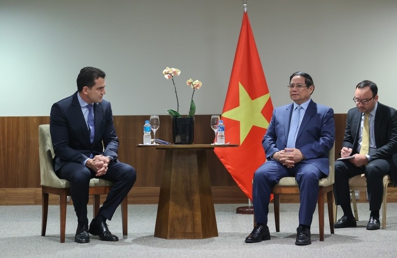 Prime Minister Pham Minh Chinh meets with a JBS leader (Photo:VGP)