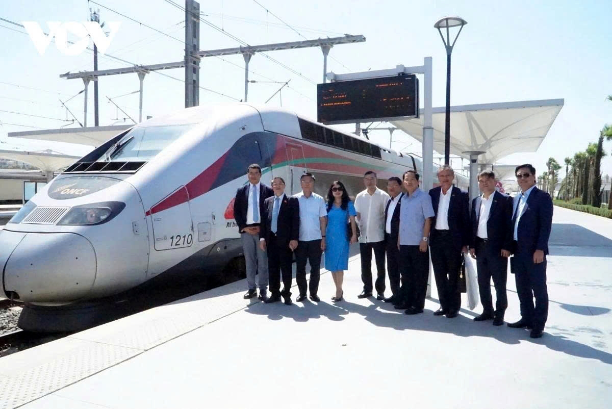 Vice Chairman of the National Assembly of Vietnam Nguyen Duc Hai and Deputy Prime Minister Le Thanh Long, along other Vietnamese officials pose for a group photo, after a high-speed rail ride from Rabat to Tangier