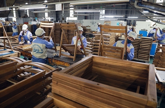 Wooden furniture products are being finalised for export to key markets such as the US and EU. (VNA/VNS Photo)