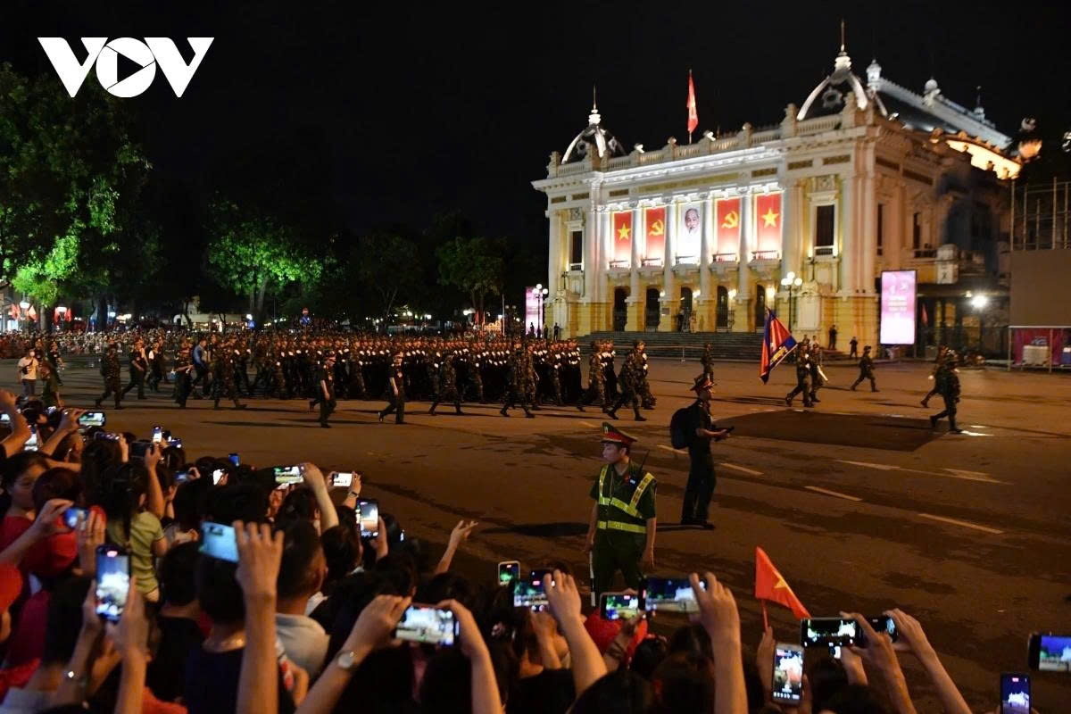 Cambodian troops from the Royal Cambodian Army march past the Opera House