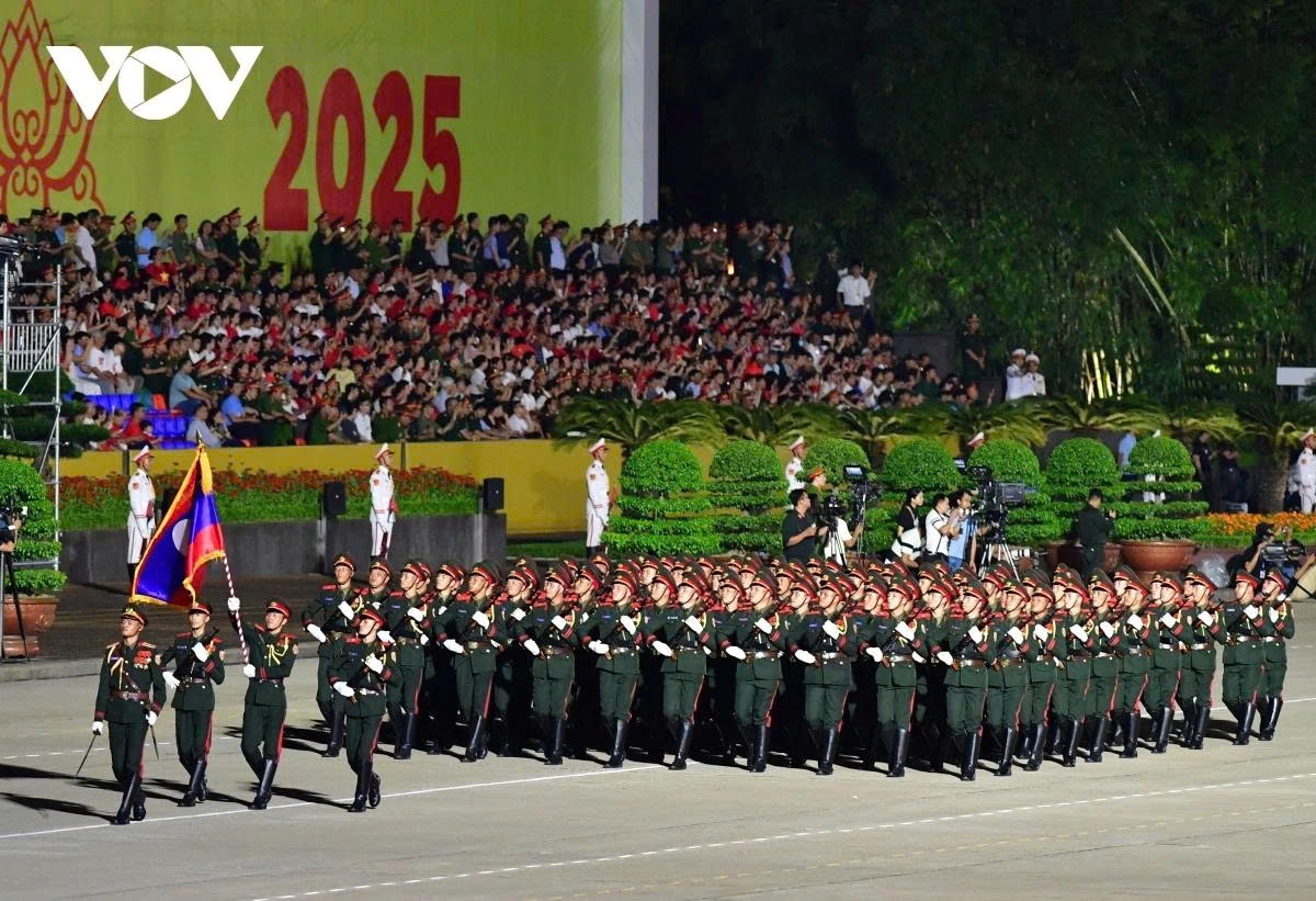 Following them is the Lao People's Army contingent.