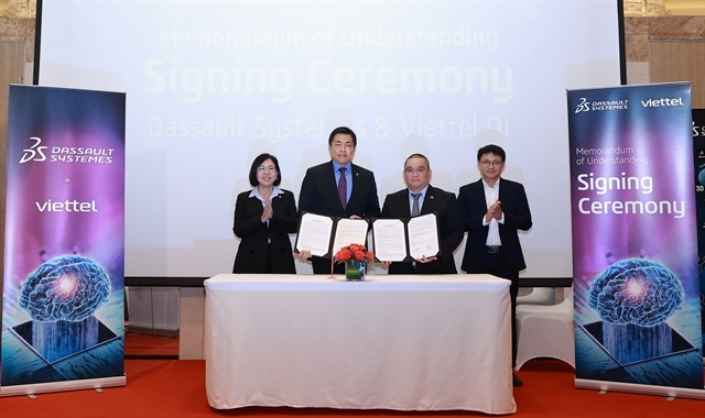 Representatives from Dassault Systèmes and Viettel pose for a photo after signing the MoU. (Photo courtesy of Dassault Systèmes)
