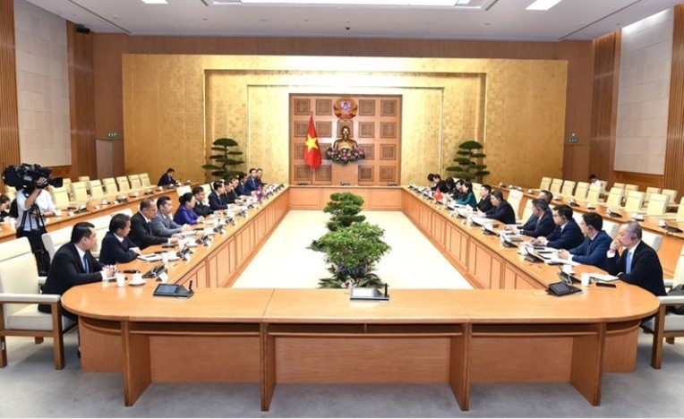 Deputy Prime Minister Ho Duc Phoc meets with the Central Enterprise Reform Committee delegation of the Lao People’s Revolutionary Party (Photo: qdnd.vn)