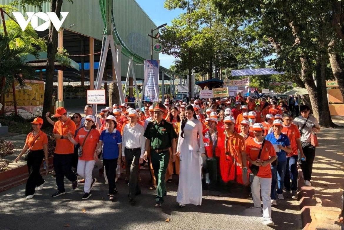 More than 5,000 people participate in a walk at Dam Sen Cultural Park in Ho Chi Minh City on August 10 in support of Agent Orange/dioxin victims 