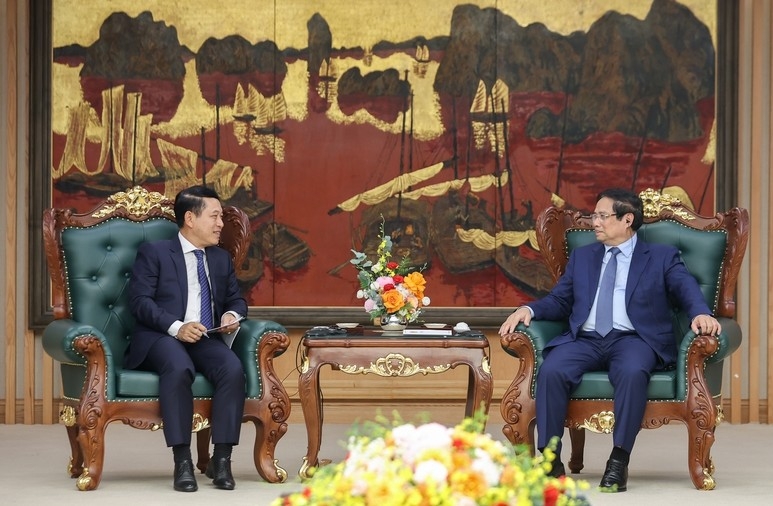 PM Pham Minh Chinh emphasizes Vietnam’s readiness to share experience with Laos on SOE reform, restructuring, as well as capital mobilisation and investment management  (Photo: VGP)