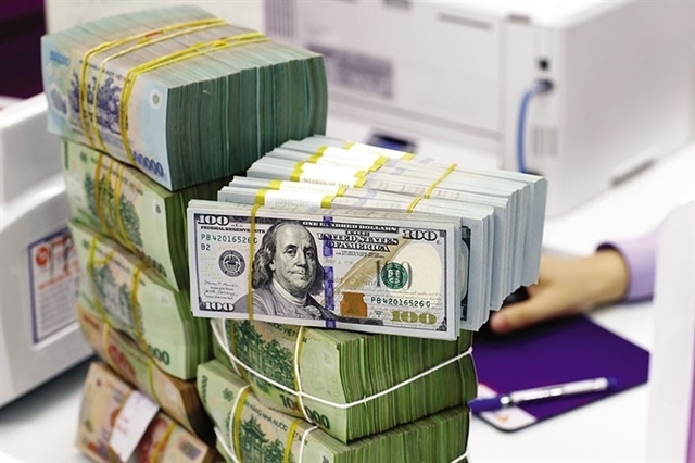 New FDI disbursement may slow if the tariff outlook after August 1 is not as expected, which can affect the foreign exchange rate in the short term. (Photo: cafef.vn)