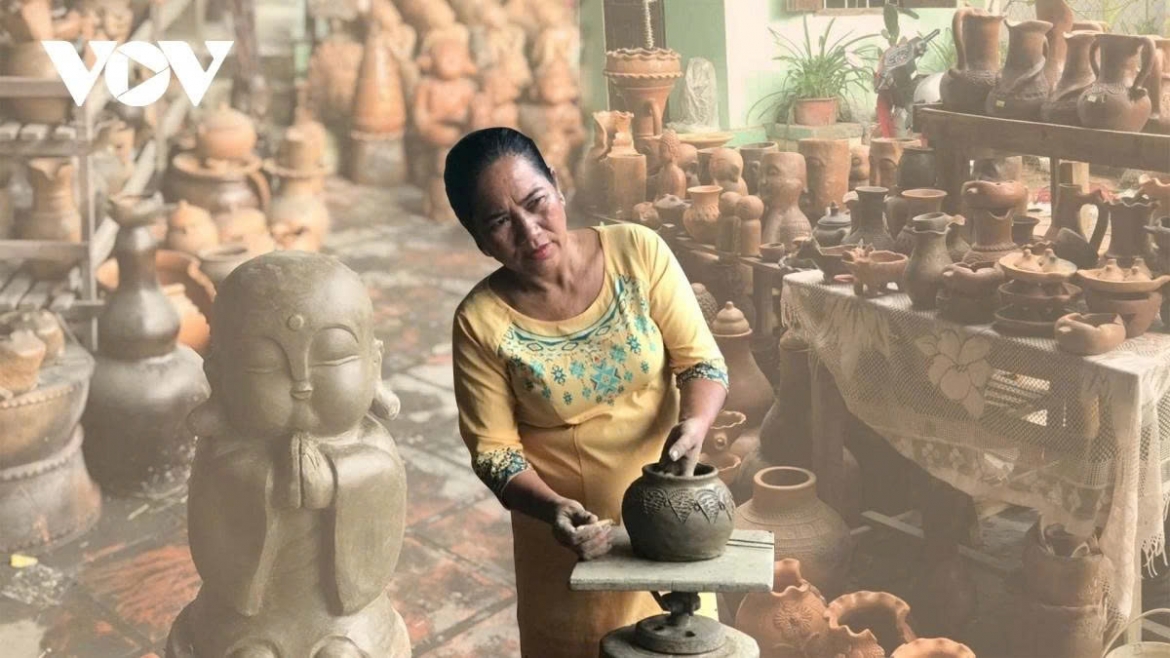 A Cham woman shapes terracotta entirely by hand in Bau Truc pottery village