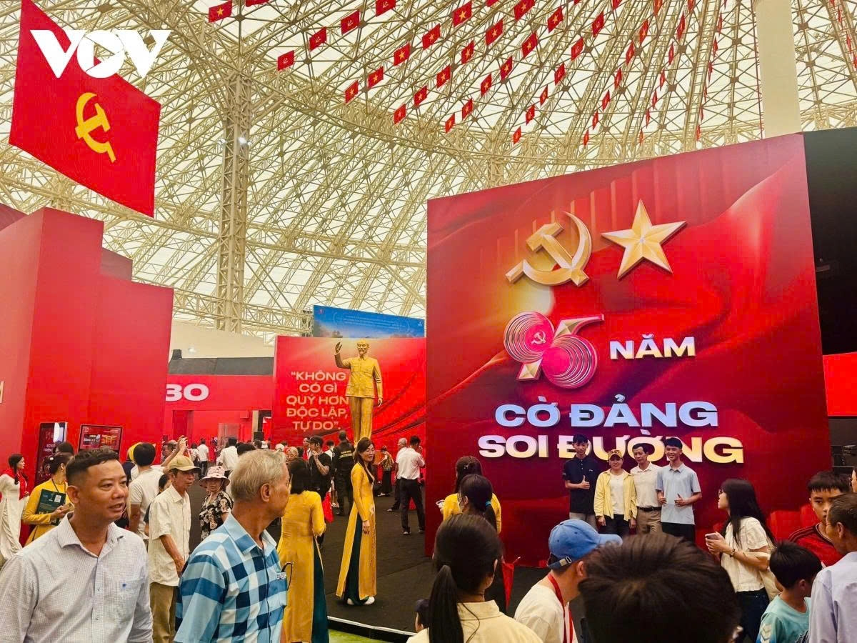Visitors learn about the leadership of the Communist Party of Vietnam since its founding on Februry 3, 1930 at an exhibition space