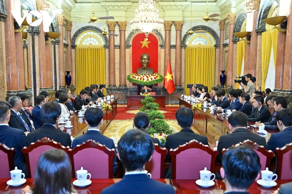 Vietnamese and Japanese officials at the meeting in Hanoi on August 22.