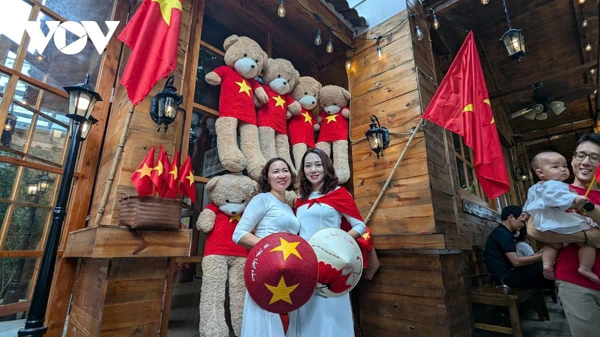 Vietnamese people take pride in the red colors of National Day