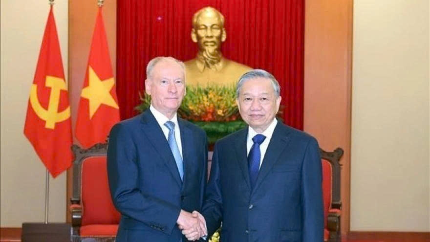 Vietnamese Party General Secretary To Lam (R) shakes hands with Nikolai Patrusev, Aide to the President of Russia and Chairman of the Russian Maritime Board, during their meeting in Hanoi on September 16