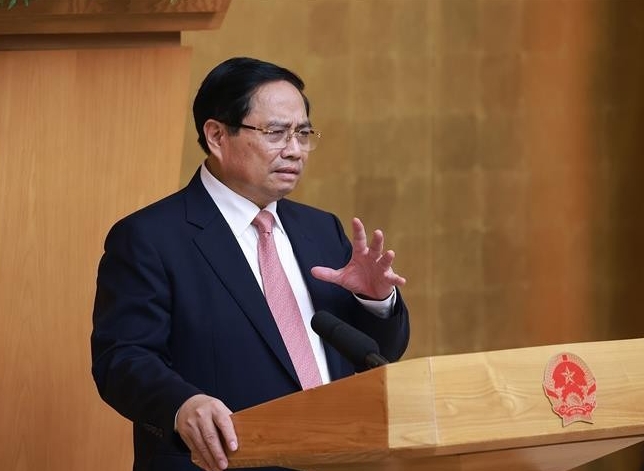 Prime Minister Pham Minh Chinh addresses the meeting (Photo: VNA)