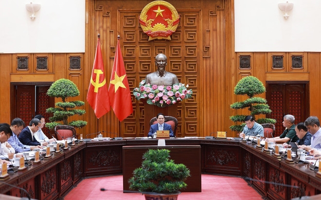 At the meeting (Photo: VNA)