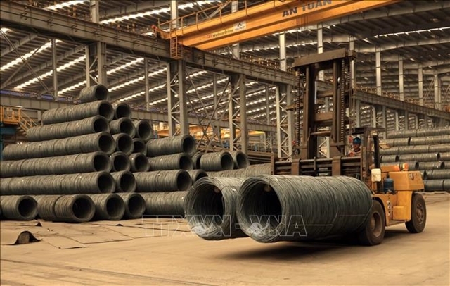 Steel production line in Thai Nguyen Province. Steel, textiles and plastic products are expected to gain from India's new tax regime. — VNA/VNS Photo