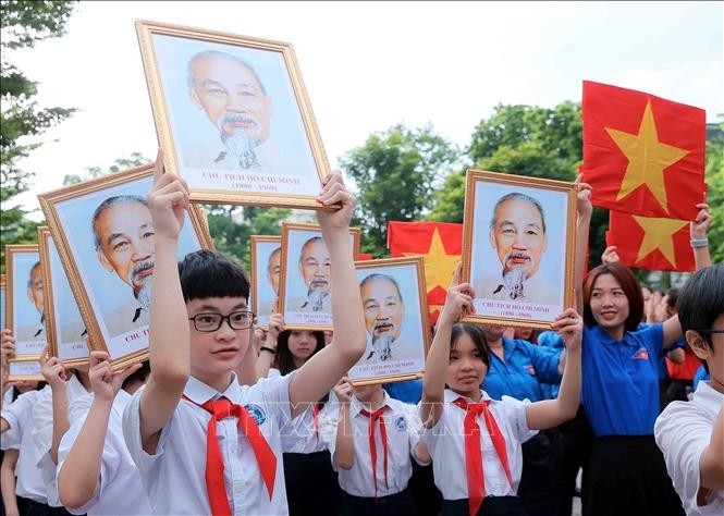 Youths perform the dance “Viet Nam Oi” at the central-level flag-raising ceremony themed “I Love My Fatherland.”