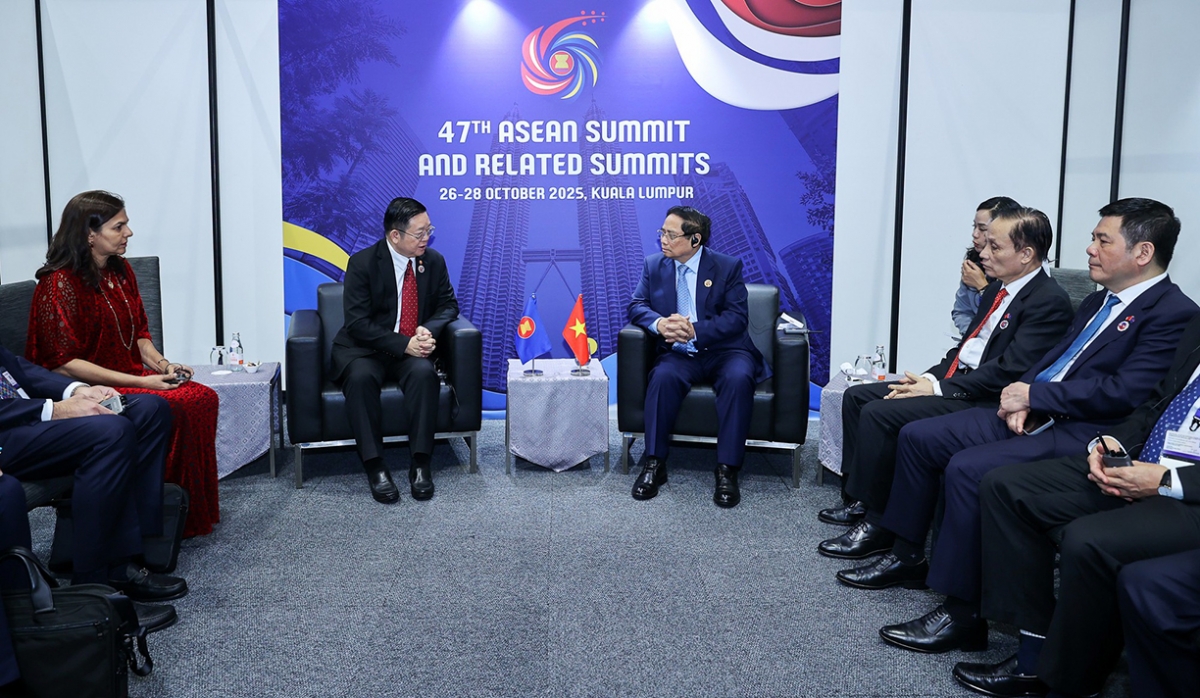 ASEAN Secretary-General Kao Kim Hourn meets with Vietnamese Prime Minister Pham Minh Chinh in Kuala Lumpur, Malaysia, on the sidelines of the 47th ASEAN Summit