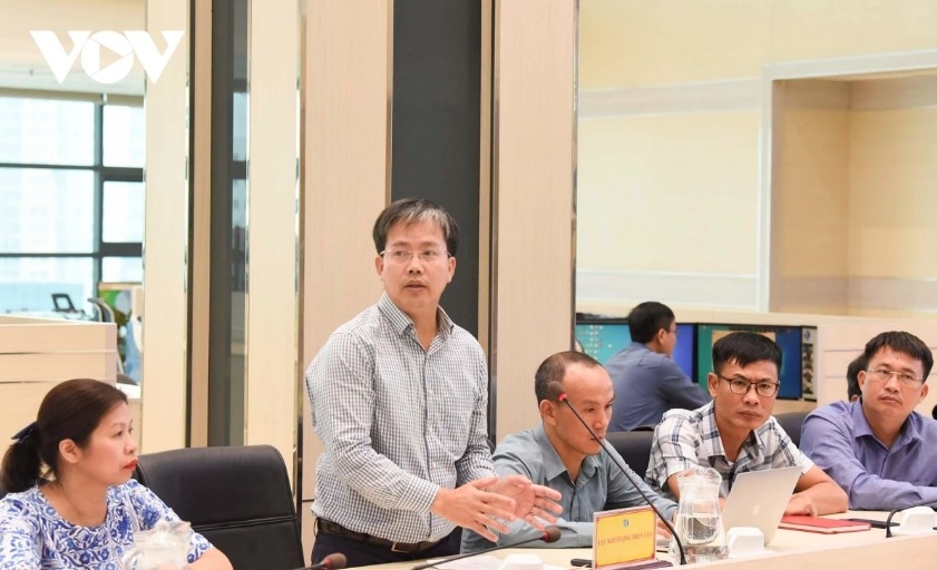 Assoc. Prof. Dr. Mai Van Khiem, Director of the National Centre for Hydro-Meteorological Forecasting, analyses Matmo’s path