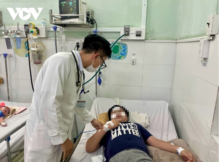 A child patient infected with dengue fever receives treatment at a hospital in Ho Chi Minh City 