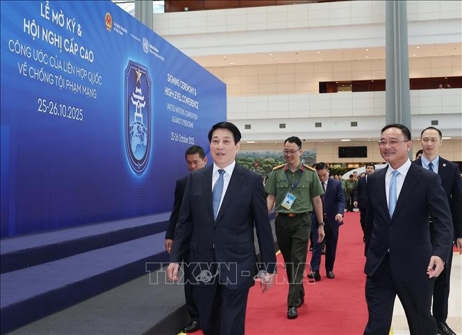 State President Luong Cuong (L) inspects preparations for the signing ceremony of the United Nations Convention against Cybercrime at the National Convention Centre in Hanoi.