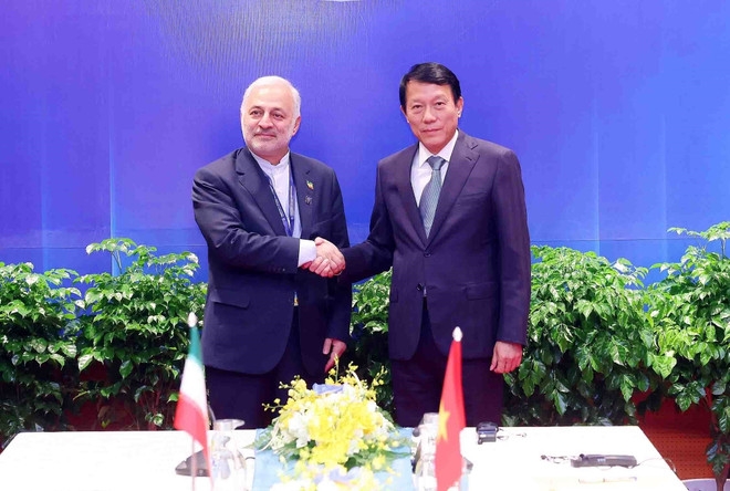 Minister of Public Security General Luong Tam Quang and Iranian Deputy Foreign Minister for Consular, Parliamentary, and Iranian Affairs Vahid Jalalzadeh. (Photo: VNA)