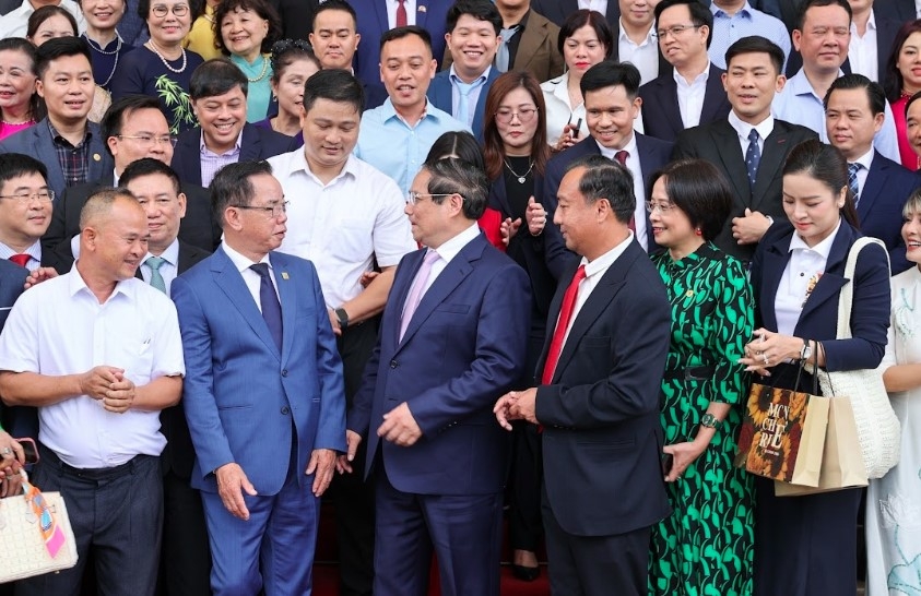 Prime Minister Pham Minh Chinh and entrepreneurs at a recent dialogue in Hanoi
