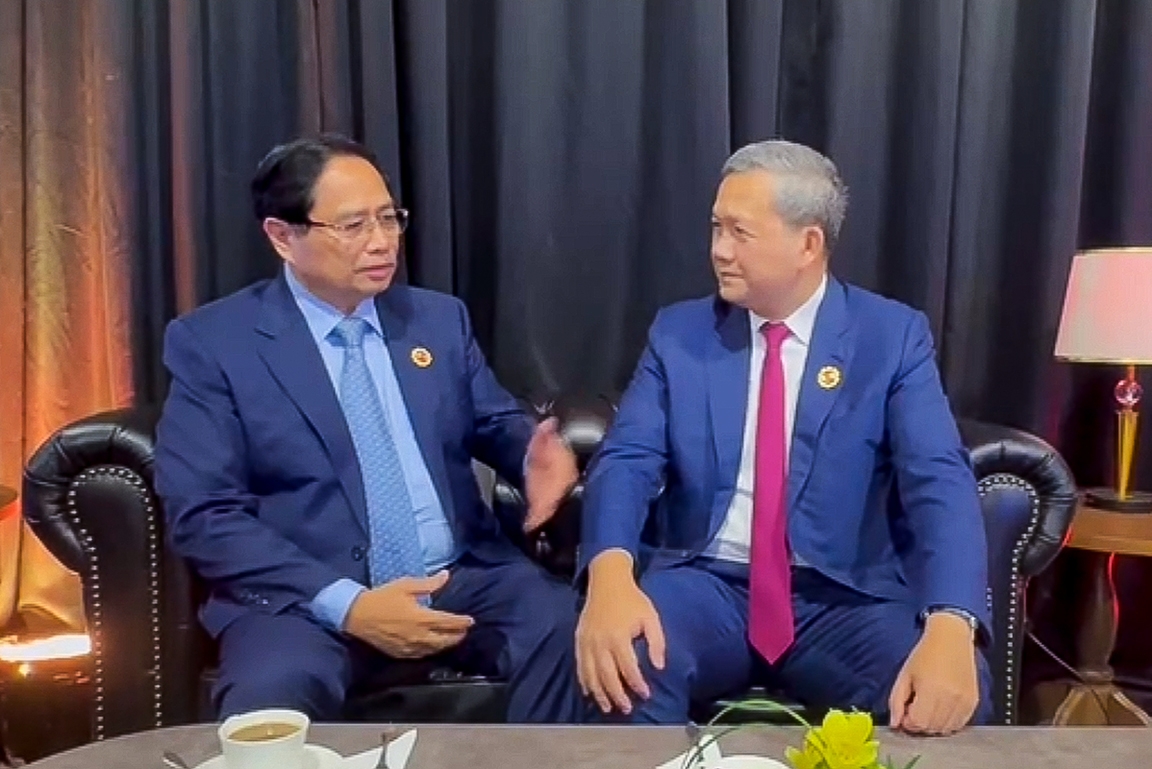 Vietnamese Prime Minister Pham Minh Chinh (L) meets with Cambodian Prime Minister Hun Manet in Malaysia on October 26