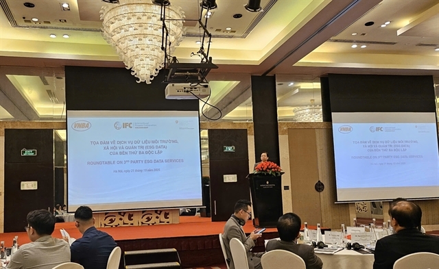 Jinchang Lai, Principal Operations Officer, Financial Infrastructure Lead for Asia and the Pacific at IFC’s Financial Institutions Group, speaks at the event. (VNS Photo Ly Ly Cao)