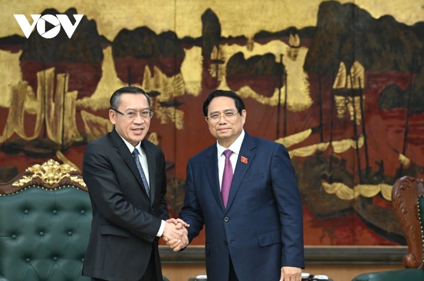 PM Pham Minh Chinh welcomes Lao Minister of Labour and Social Welfare Phosay Sayasone