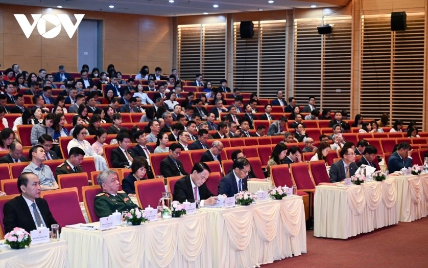 Delegates attend the event