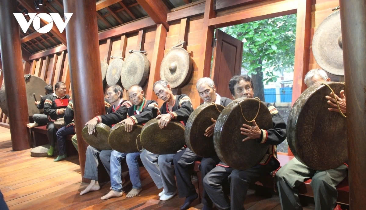 The ritual begins with the lively sounds of gongs and drums, calling the community to gather in the living room of the long house.