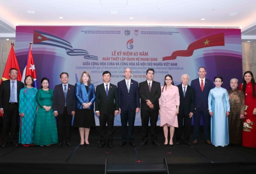 Delegates at the ceremony marking the 65th anniversary of the establishment of diplomatic relations between Vietnam and Cuba, held in HCM City on December 9. (Photo: VNA)