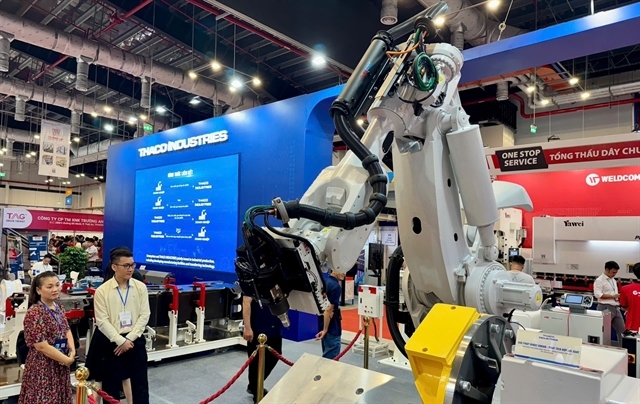 More than 200 booths from domestic and foreign-invested enterprises are showcased at the Supporting Industry Exhibition and Forum 2025 in HCM City. (VNA/VNS Photo)