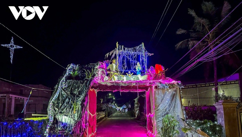 A decorated entrance in a residential area of Kim Chau Parish, Dray Bhang Commune, as parishioners put the finishing touches on a Nativity scene and Christmas tree made from self-crafted materials and sold at local shops.