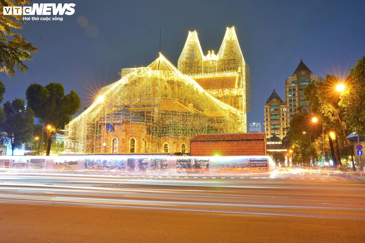 The Notre Dame Cathedral in Sai Gon ward has been has been adorned with golden strings of lights for the Christmas season.