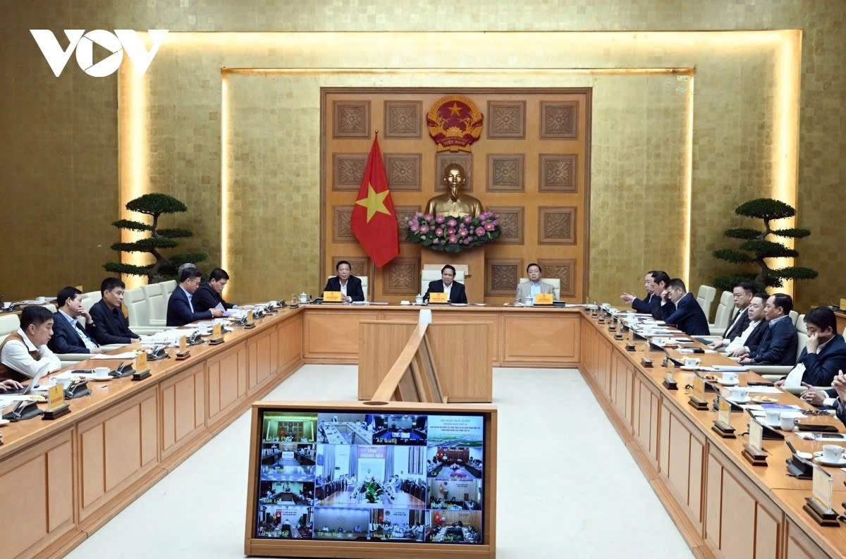 Prime Minister Pham Minh Chinh chairs the 22nd meeting of the National Steering Committee for key national projects in the transport sector in Hanoi on December 9