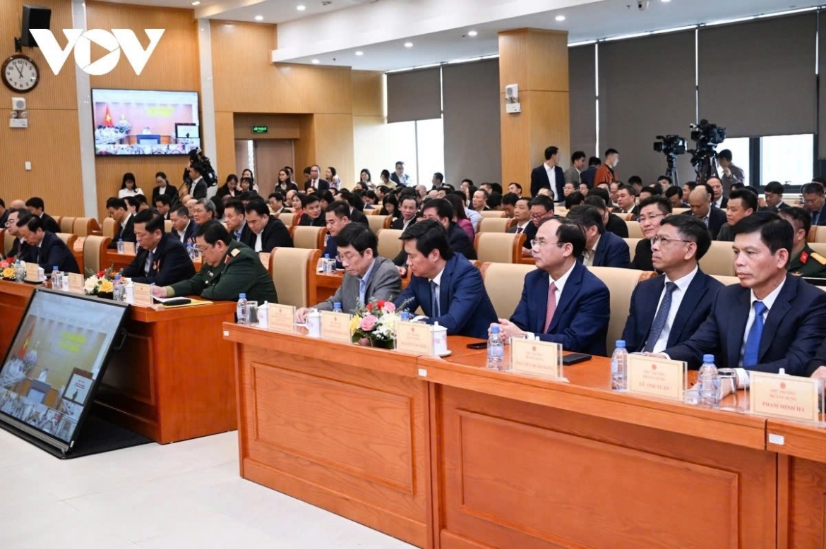 Delegates attend the Ministry of Construction's review conference in Hanoi on December 21