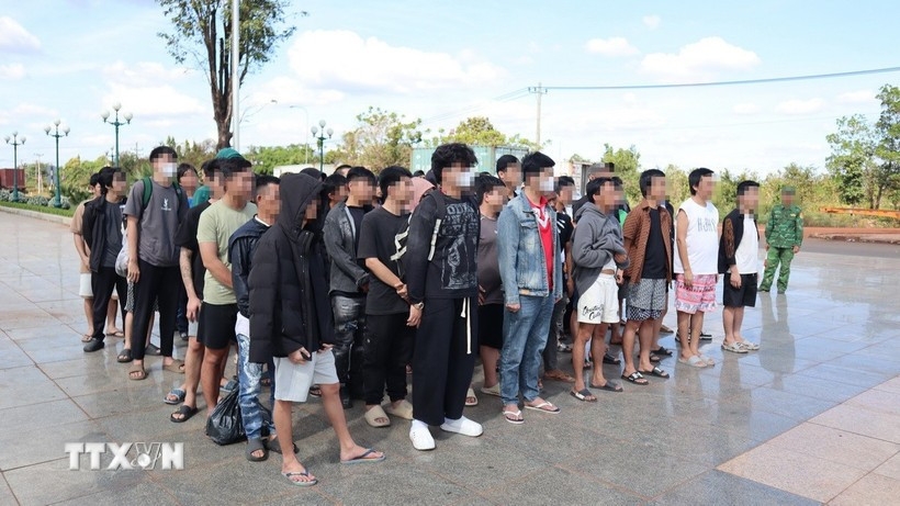 Sixty-three Vietnamese citizens are handed over by Cambodian authorities.