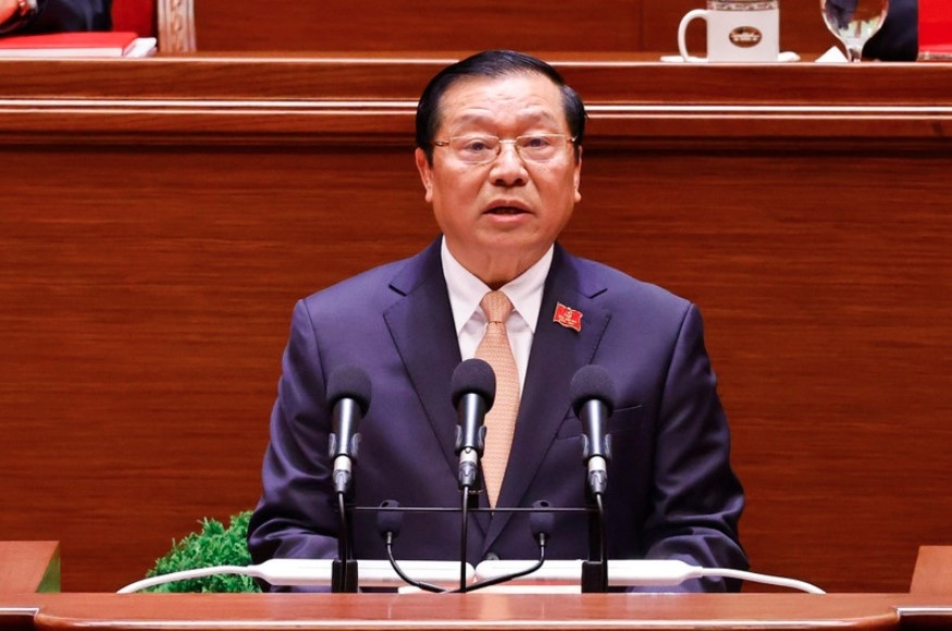 Standing Vice Chairman of the Party Central Committee's Commission for Information, Education and Mass Mobilisation Lai Xuan Mon delivers the report. (Photo: VNA)