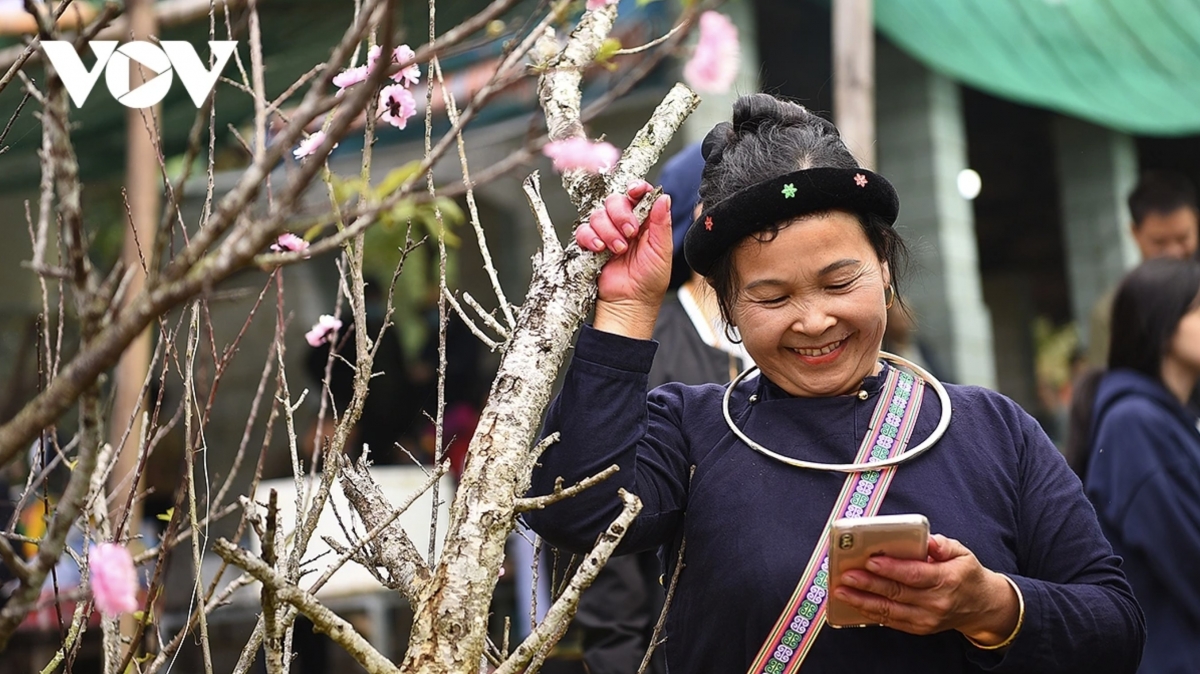 Ethnic community members share the New Year 2026 atmosphere at the Vietnam National Village for Ethnic Culture and Tourism.