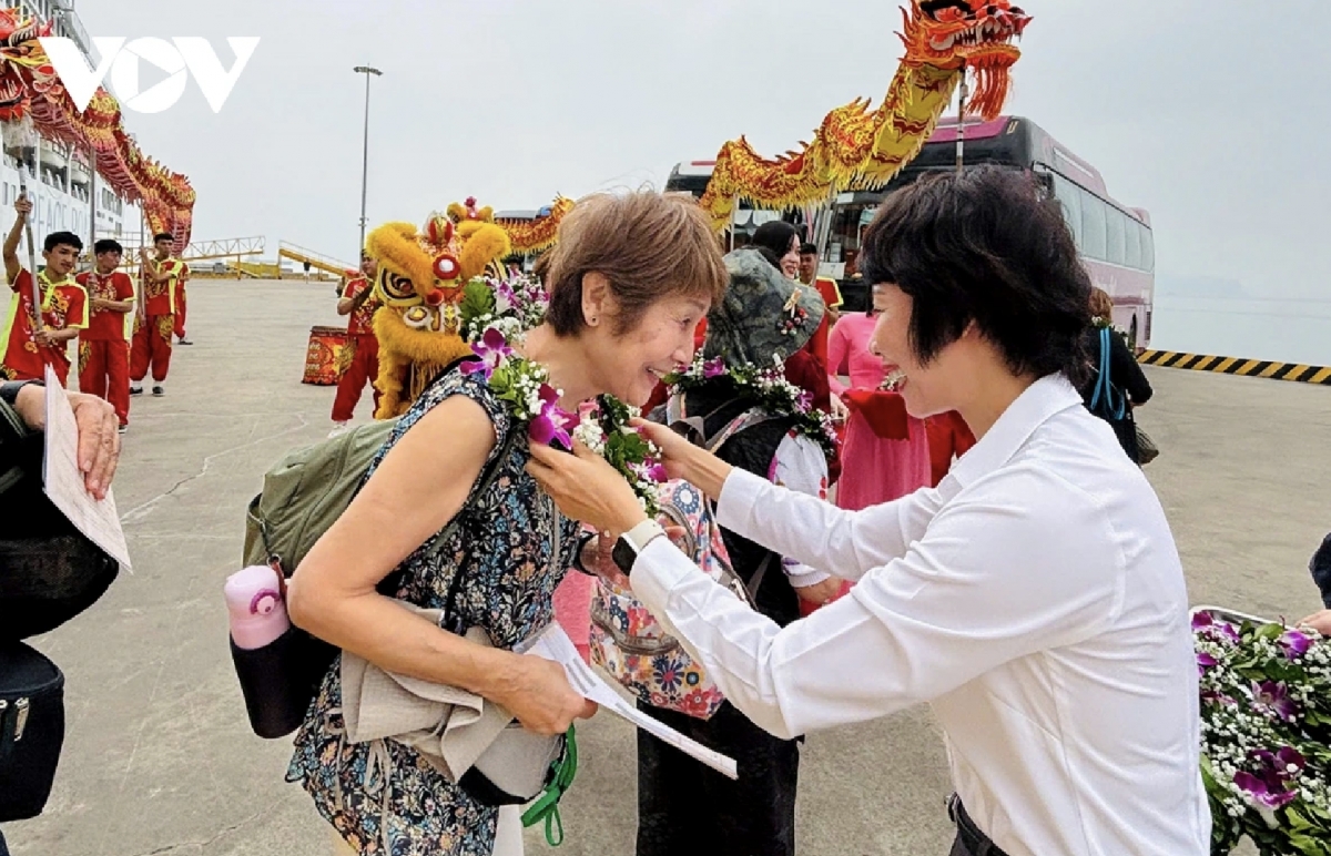 Japanese tourist is welcomed upon arrival at Ha Long Port.