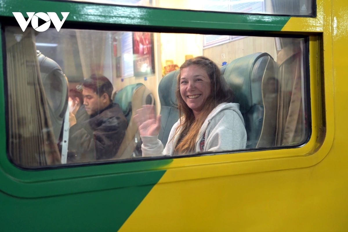 The bright, eager gaze of a young passenger reflects the excitement of experiencing a long-distance journey with family for the first time.