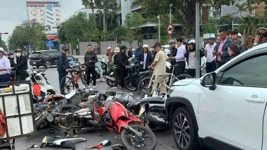 A car plows into multiple motorbikes waiting at a red light in the northern port city of Hai Phong on February 21 or the fifth day of the Lunar New Year, leaving several people injured.