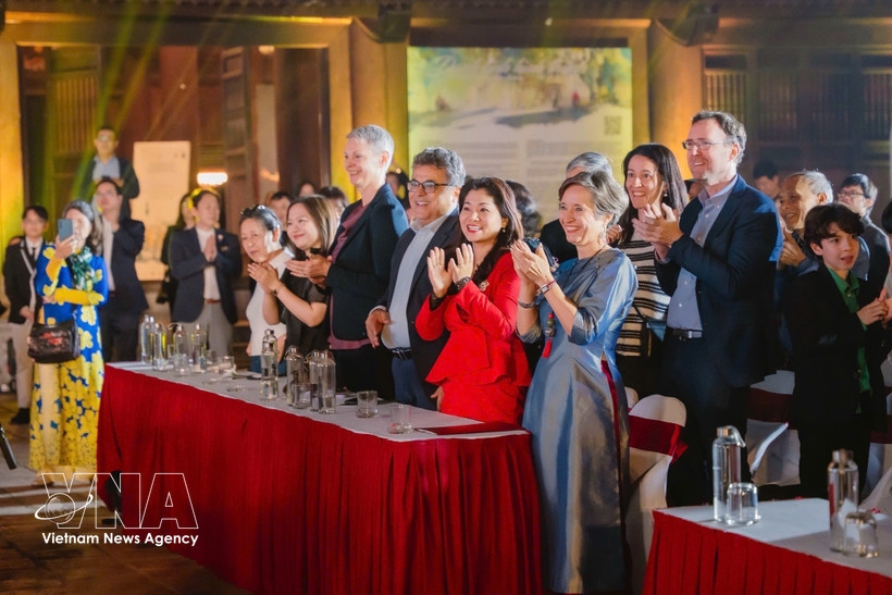 Polish Ambassador to Vietnam Joanna Skoczek (R) attends a cultural event in Vietnam