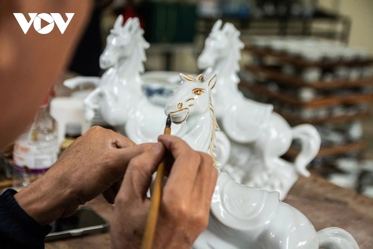 The craftsman not only shapes the figurines but also breathes life into them.
