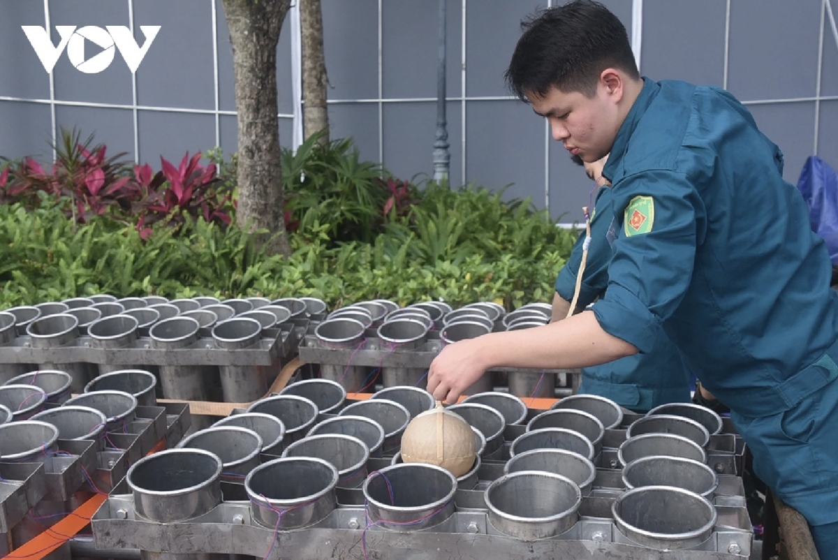 Loading fireworks into the launch tubes requires meticulous attention to every detail.