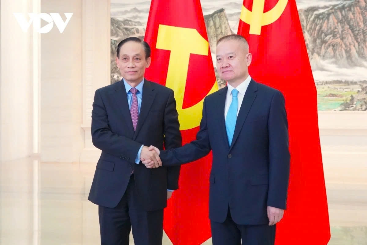 Le Hoai Trung (L), Politburo member and Minister of Foreign Affairs of Vietnam, and Liu Haixing, member of the Communist Party of China (CPC) Central Committee and Head of the CPC Central Committee’s International Department, ahead of their talks in Beijing on February 4